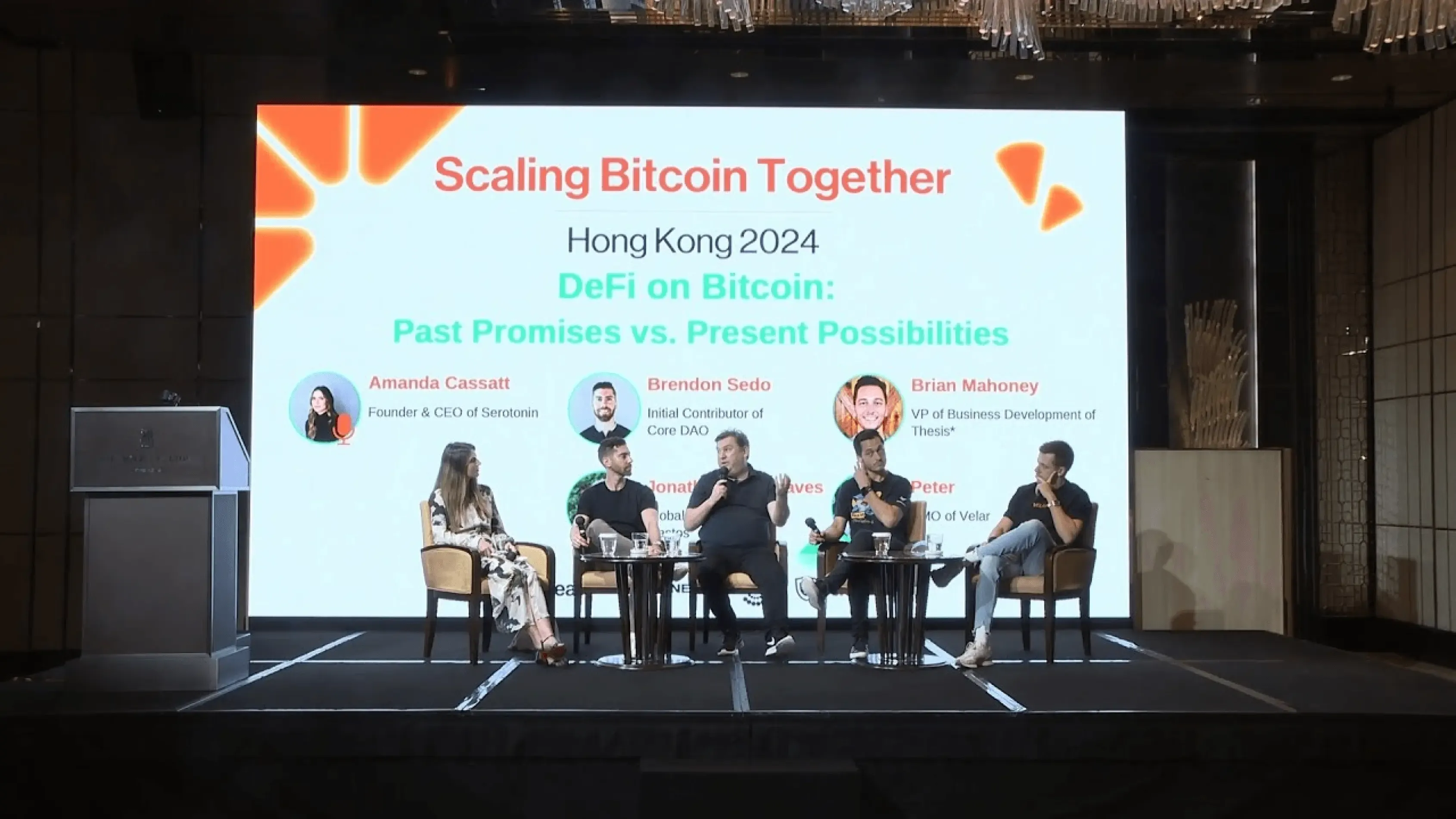Scaling Bitcoin Together 2024 – Panel discussion in Hong Kong on DeFi innovations on Bitcoin, featuring industry experts on stage.