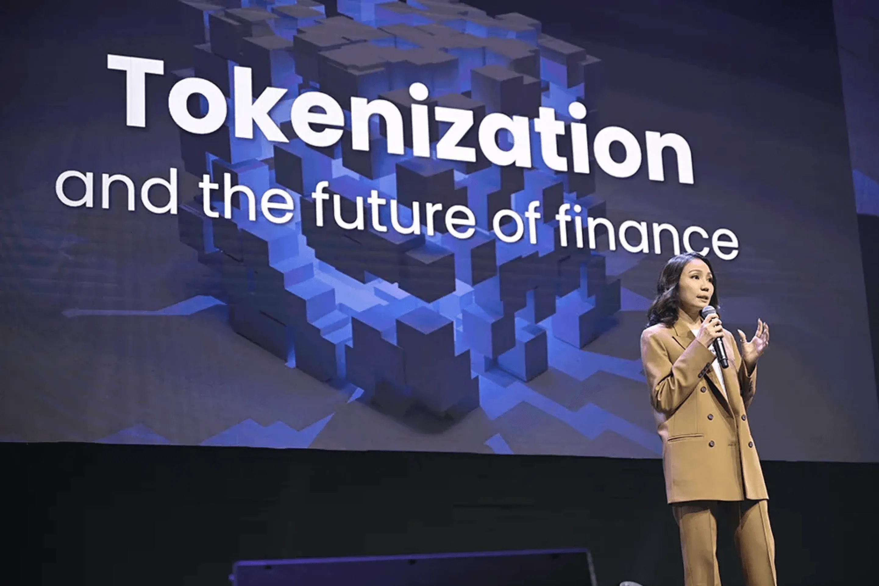 World Tokenization Summit 2023 – Speaker presenting insights on tokenization and the future of finance on a conference stage.