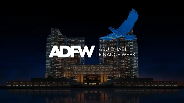 Abu Dhabi Finance Week 2023 (ADFW) logo displayed with a blue falcon soaring above a nighttime cityscape of Abu Dhabi's skyline.
